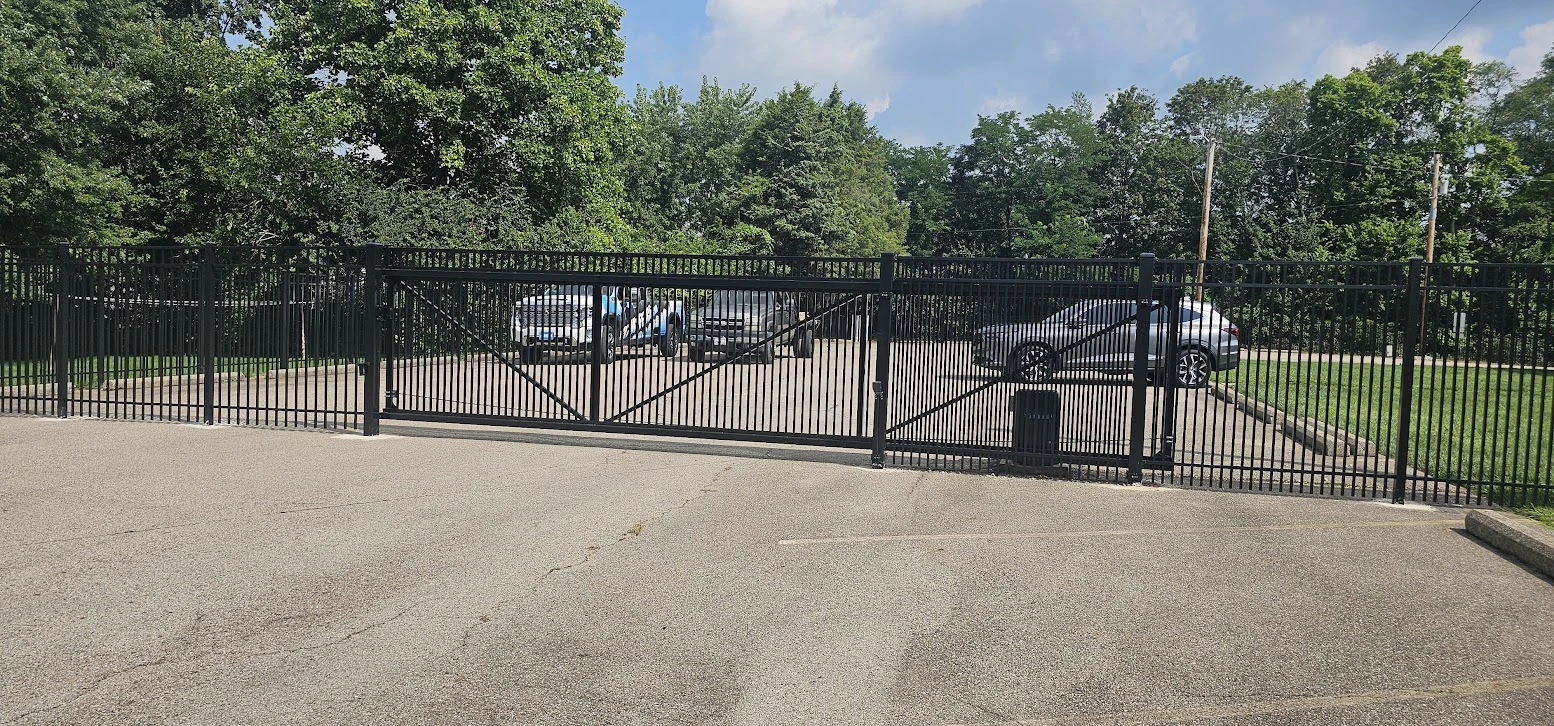 Ornamental aluminum fence installation with cantilever gate in Beavercreek Ohio
